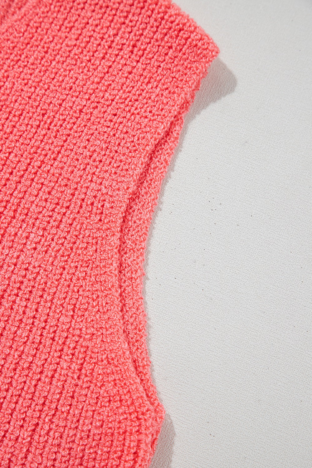 Burnt Coral textured knit tank top with a tie-front detail.