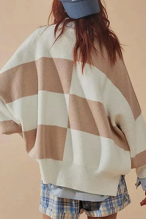 Checkerboard knit oversized sweater in dust storm and cream with crew neck and drop shoulders.