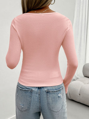 Textured knit scoop neck sweater in watermelon pink with lace detail.