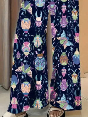 Dark blue wide-leg maternity trousers with a colorful beetle and butterfly print.