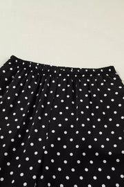 Black polka dot wide-leg maternity trousers with elastic waistband