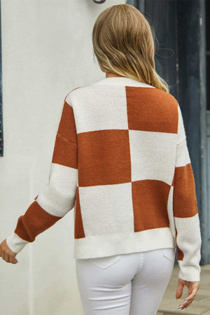 Colorblock geometric knit cardigan in caramel and white acrylic, with a checkerboard pattern.