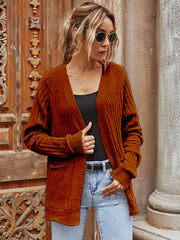 Brown textured knit cardigan with pockets and ribbed cuffs, open front.