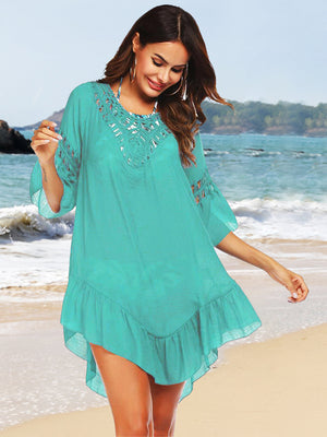 Turquoise cover-up with lace neckline and ruffled hem, short sleeves, beachwear