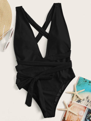 Black wrap-around halterneck plunge swimsuit with crisscross straps and a tie waist.