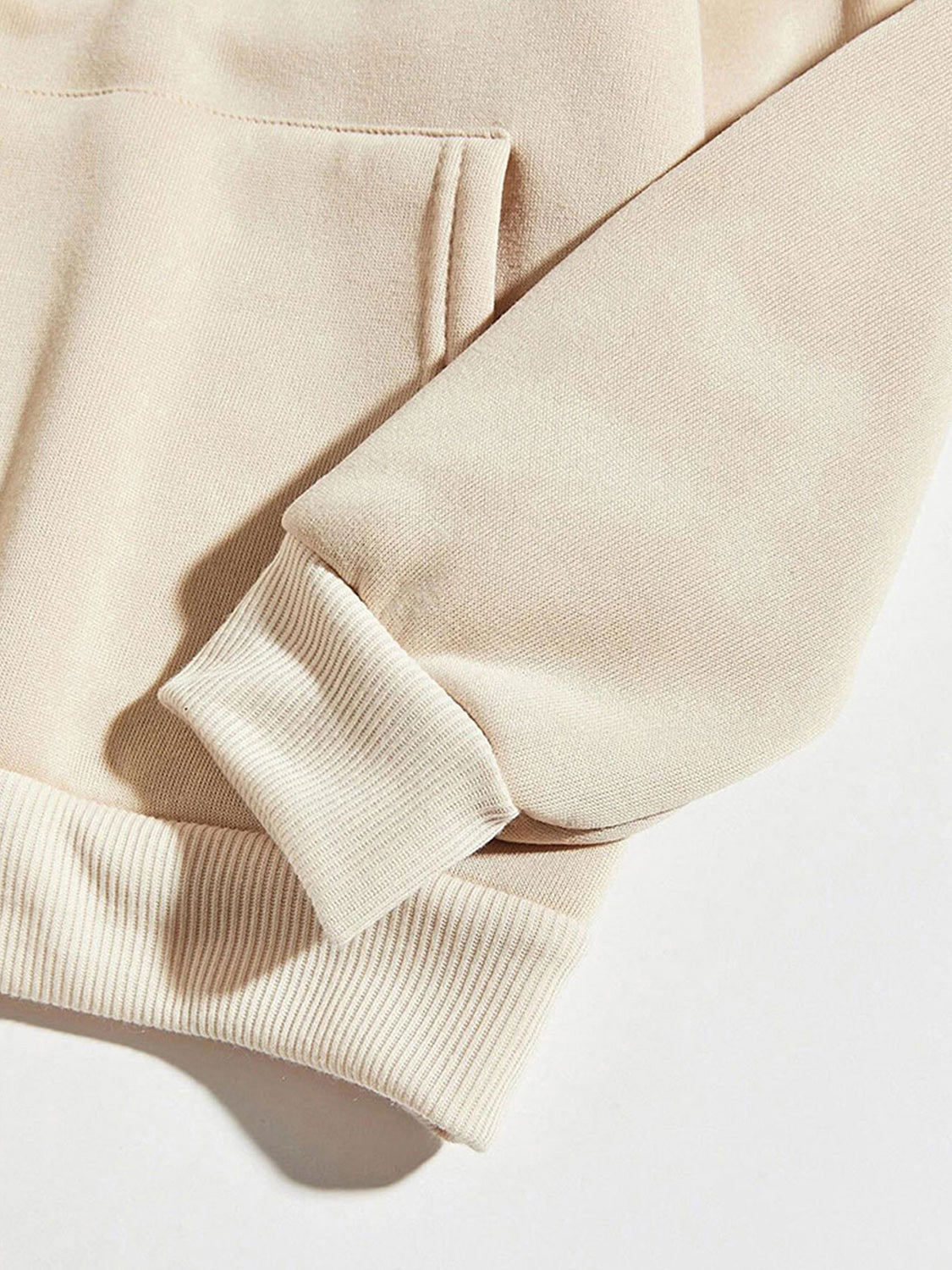 Chestnut hoodie with ribbed cuffs and hem, and a front pocket detail.