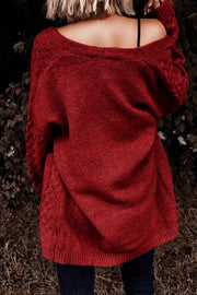 Deep Red open-knit pocket cardigan with cable knit detail on sleeves and sides.