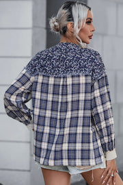 Mixed media plaid blouse with floral yoke and frayed detail.
