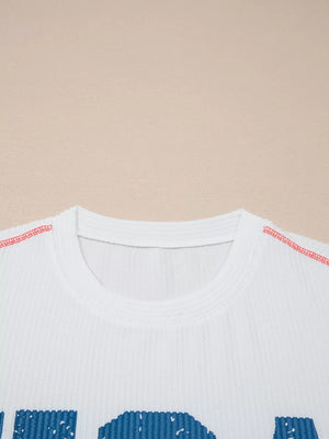 White ribbed t-shirt with contrast stitching and distressed USA graphic.