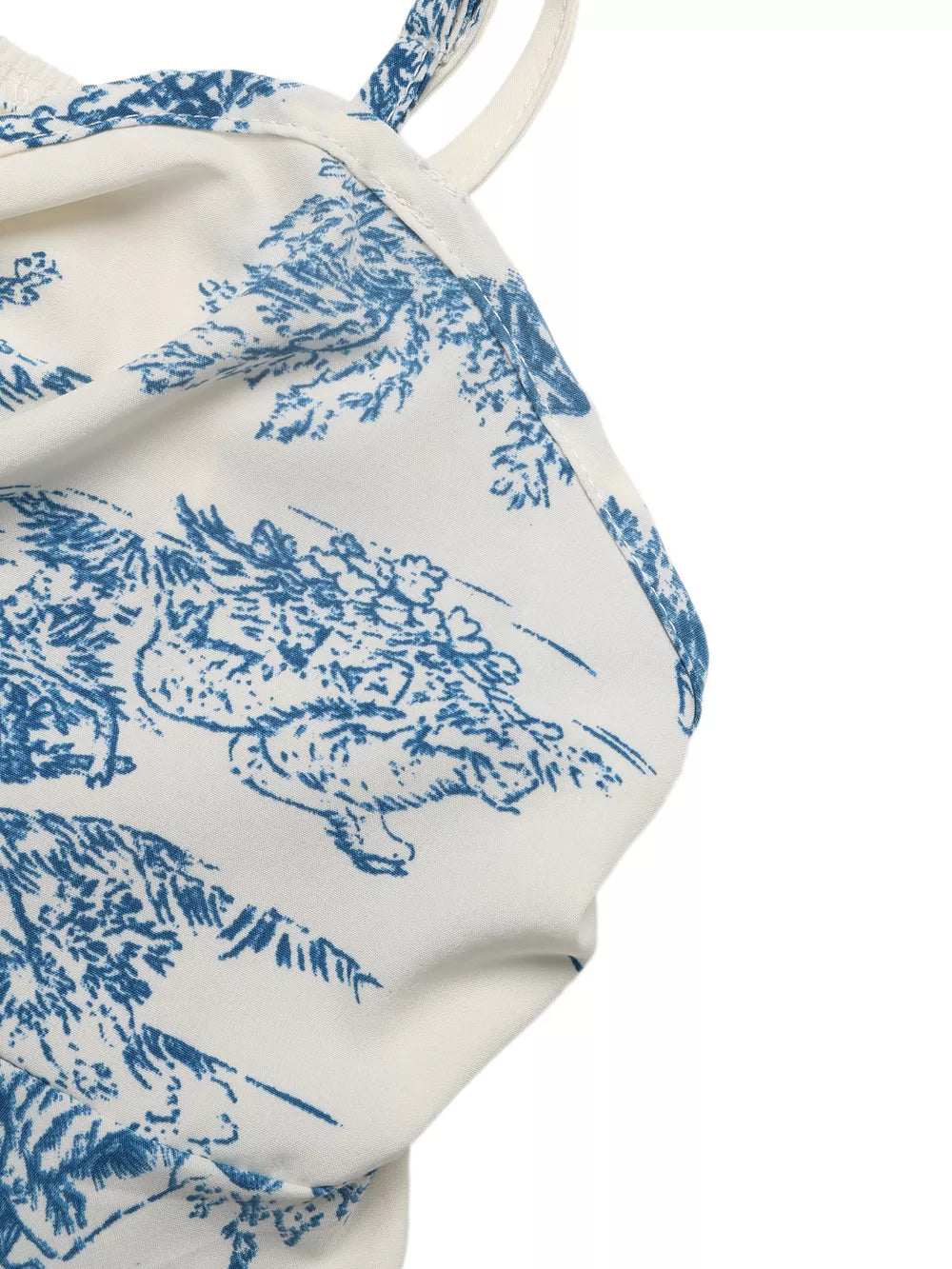 Charming floral tie-front cami top in white with blue toile print and adjustable straps.