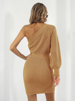 One-sleeve knit mini dress in caramel acrylic with a fitted silhouette and balloon sleeve.