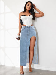 Light blue denim maxi skirt with a high slit and raw hem.