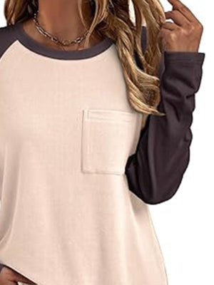 Pocketed round neck long sleeve t-shirt in tan with dark gray sleeves and a chest pocket.