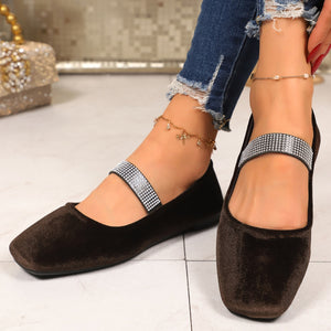 Brown velvet square toe slip-on flats with rhinestone strap detail.