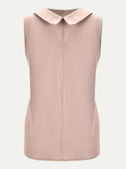 Peter Pan collar sleeveless blouse in light pink with a textured fabric and back seam detail.