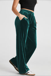 Velvet lounge trousers in Black Forest with drawstring waist and wide legs.