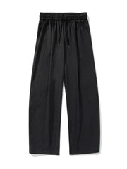 Black balloon-fit drawstring trousers with a relaxed casual style.
