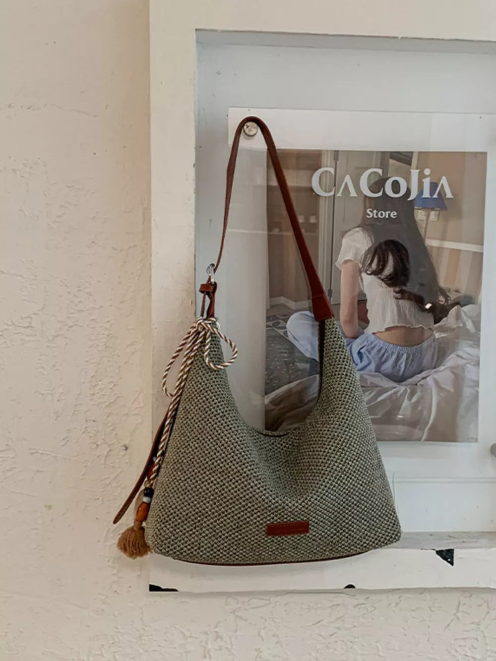 Tassel Woven Shoulder Bag in Sky Blue, close-up detail