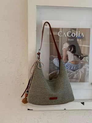 Tassel Woven Shoulder Bag in Sky Blue, close-up detail