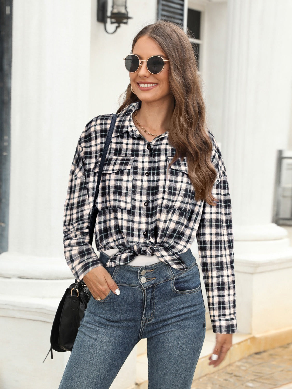 Black plaid button-up shirt with two chest pockets, tied at the waist