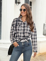 Black plaid button-up shirt with two chest pockets, tied at the waist