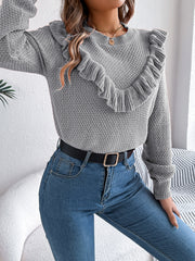 Gray knit sweater with textured yoke and ruffled neckline detail