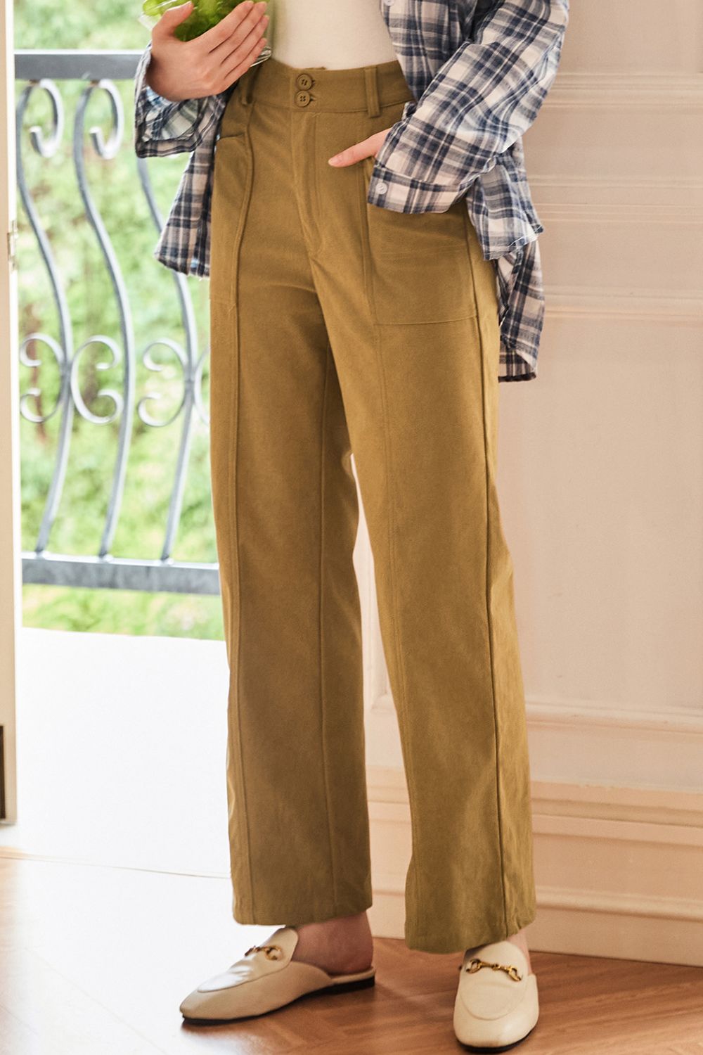 Seamed front wide leg trousers in caramel with buttoned fly and pocket details.