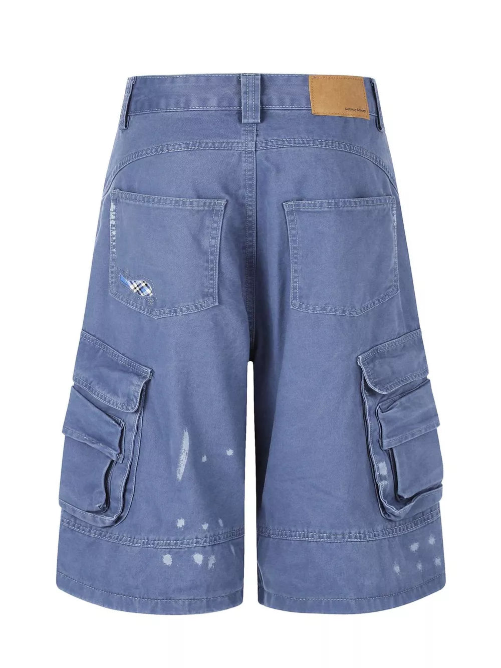 Blue faded cargo capris with distressed paint splatters and stylish patch detail.