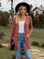 Longline ribbed knit button-down cardigan in Rust with pockets and a V-neck.