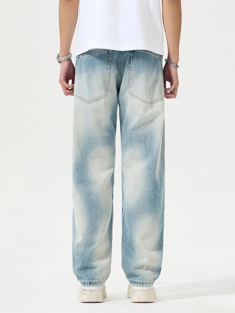 Men's Distressed Relaxed Fit Jeans in Light, model styling view