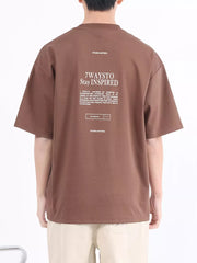 Brown cotton blend crew neck t-shirt with "7WAYSTO Stay INSPIRED" graphic on back.