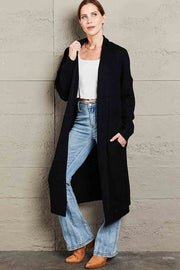 Black textured knit maxi cardigan with pockets and an open front.