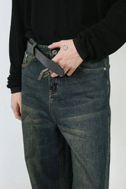 Faded denim wide-leg trousers in dark, with a relaxed fit and visible distressing.