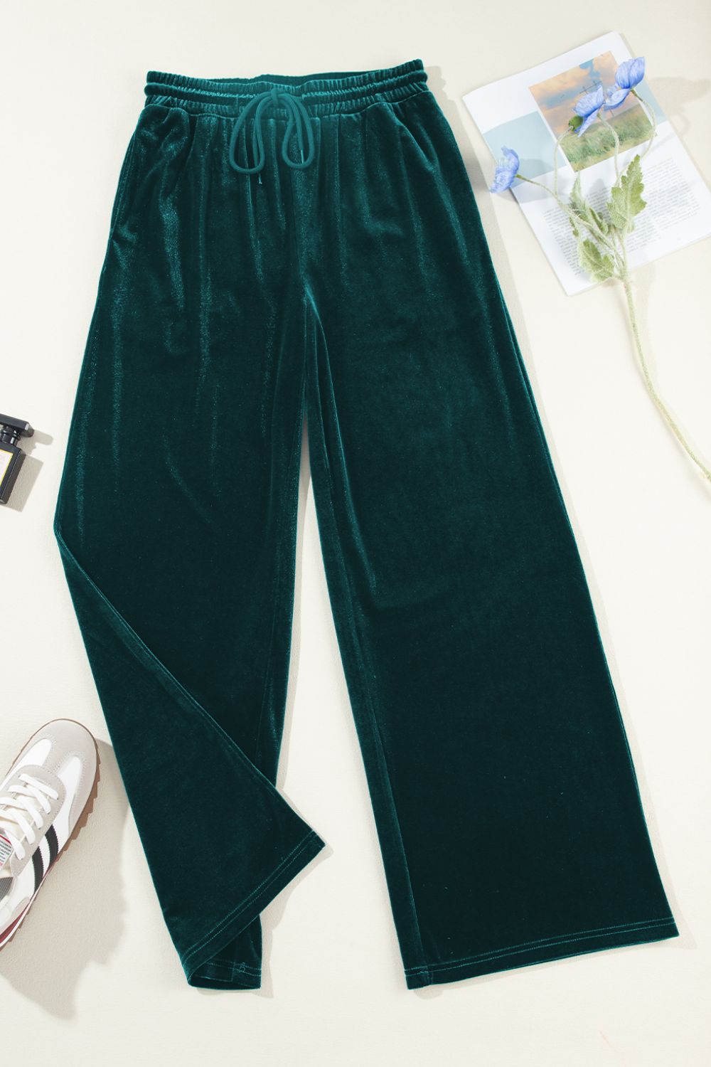 Velvet lounge wide-leg drawstring trousers in black forest green with pockets.