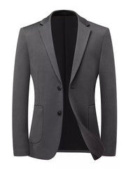Dark gray acrylic two-button men's blazer with lapel collar and flap pockets.