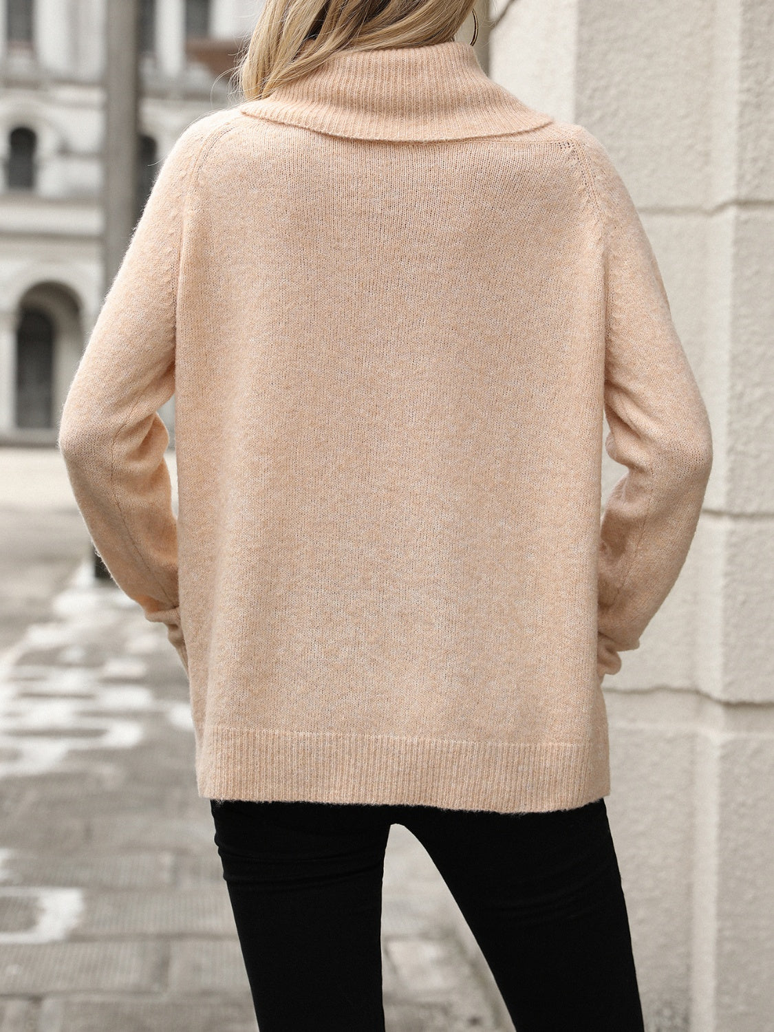 Apricot cowl neck knit pullover sweater with ribbed cuffs and hem.
