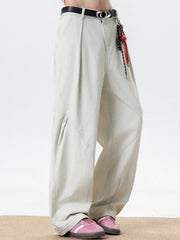 Men's cream pocketed wide leg sweatpants with belt loops and a drawstring detail.