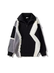 Plus-size color block zip collar sweater in black, white, and grey with a ribbed knit and geometric pattern.