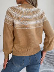 Tan knit sweater with geometric yoke pattern, crew neck, long sleeves, and ribbed cuffs and hem.