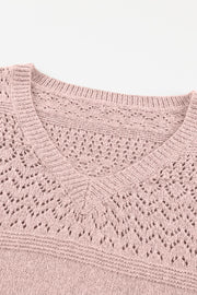 Dusty pink perforated knit V-neck pullover sweater with openwork detail.