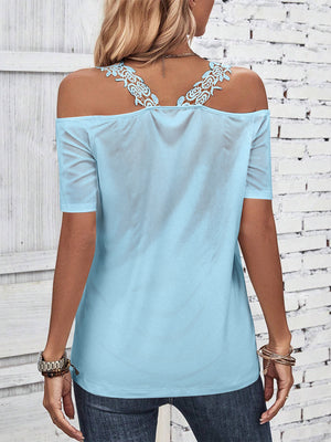 Pastel blue off-the-shoulder top with lace yoke detail and short sleeves.