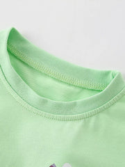 Light green cotton t-shirt with unicorn graphic detail and reinforced neckline.