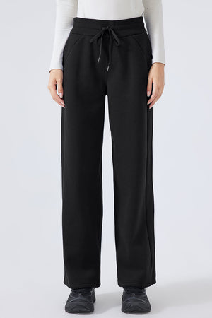 Black relaxed palazzo sweatpants with drawstring waist and pockets