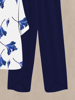 Floral print half sleeve top with dark blue wide leg pants