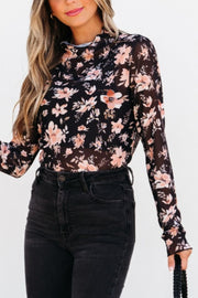 Black sheer floral mock neck blouse with long sleeves