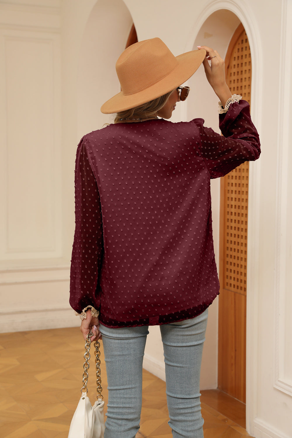 Wine embroidered Swiss dot blouse with poet sleeves and lace cuffs.