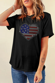 Black t-shirt with a rhinestone American flag heart graphic on the front