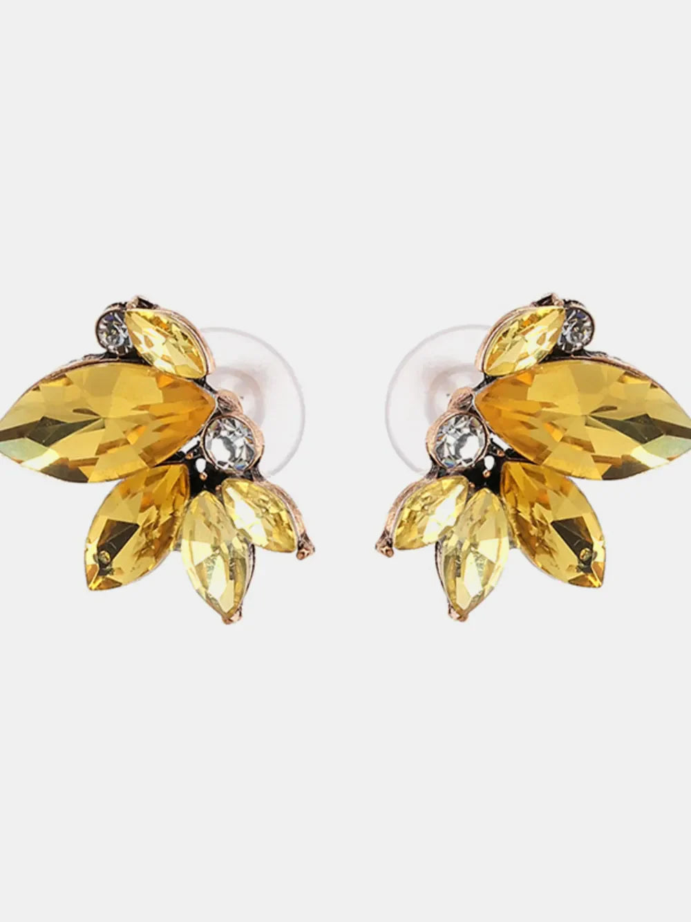 Gemstone petal cluster stud earrings in antique gold with yellow and clear crystals.