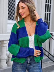 Colorblock balloon sleeve knit cardigan in green and blue acrylic with a relaxed fit.