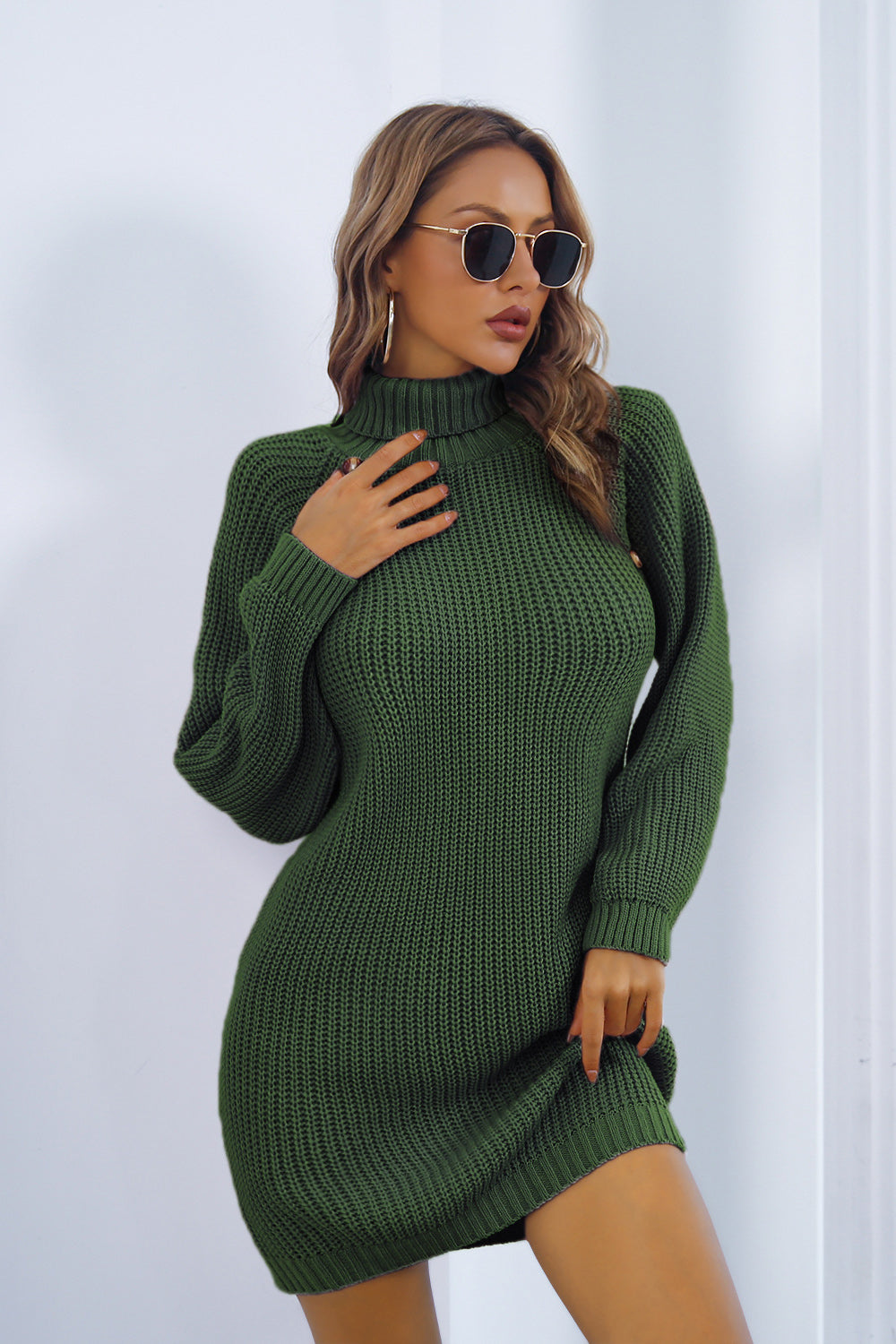 Green acrylic knit turtleneck mini dress with button detail